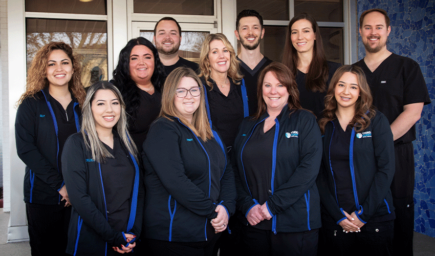 Dental office team photo for Third Coast Family Dental in West Allis, WI.
